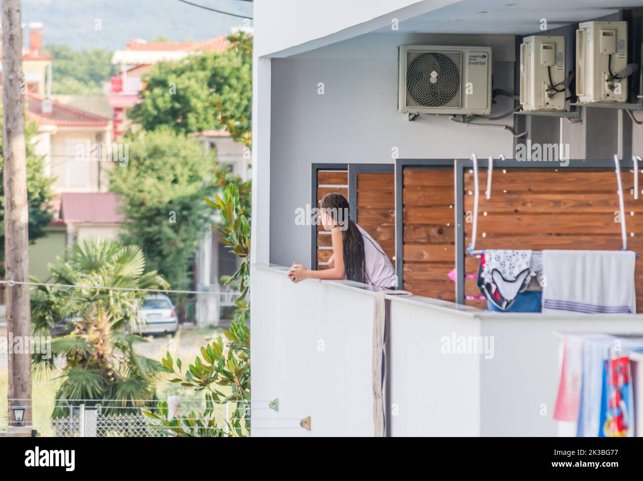 Leptokarya, Greece - June 10, 2018: A view of the guests of a private hotel in the small quiet town of Leptokaria, Greece. Stock Photo