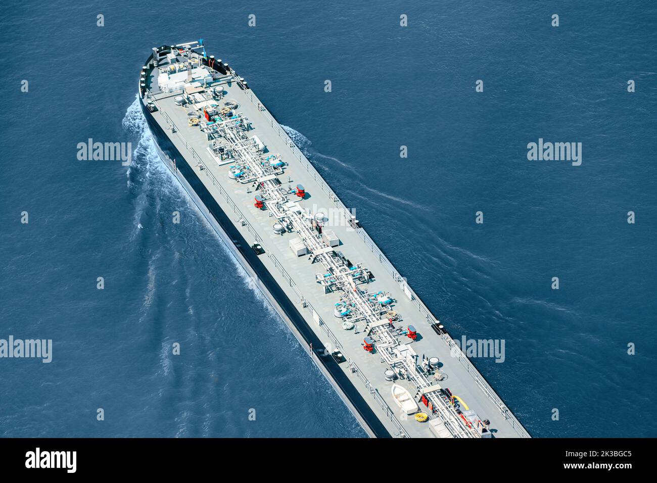 Aerial view of a large gas or oil tanker ship. Infrastructure and transportation of fuel and import of hydrocarbons Stock Photo