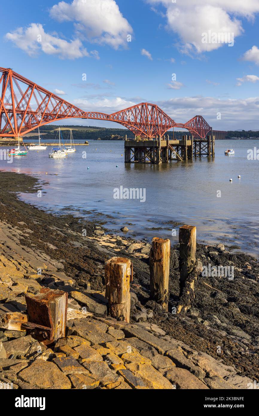The Forth rail bridge spreading across the Firth of Forth connecting north and south Queensferry. Taken from North Queensferry. Stock Photo