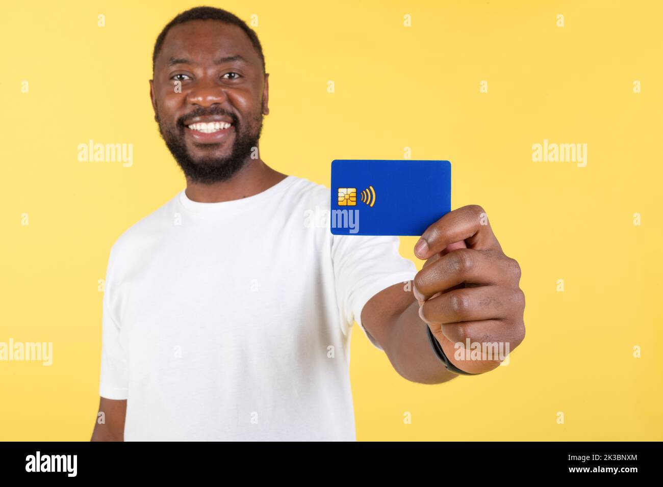 Smiling Black Man Showing Credit Card Advertising Bank, Yellow ...