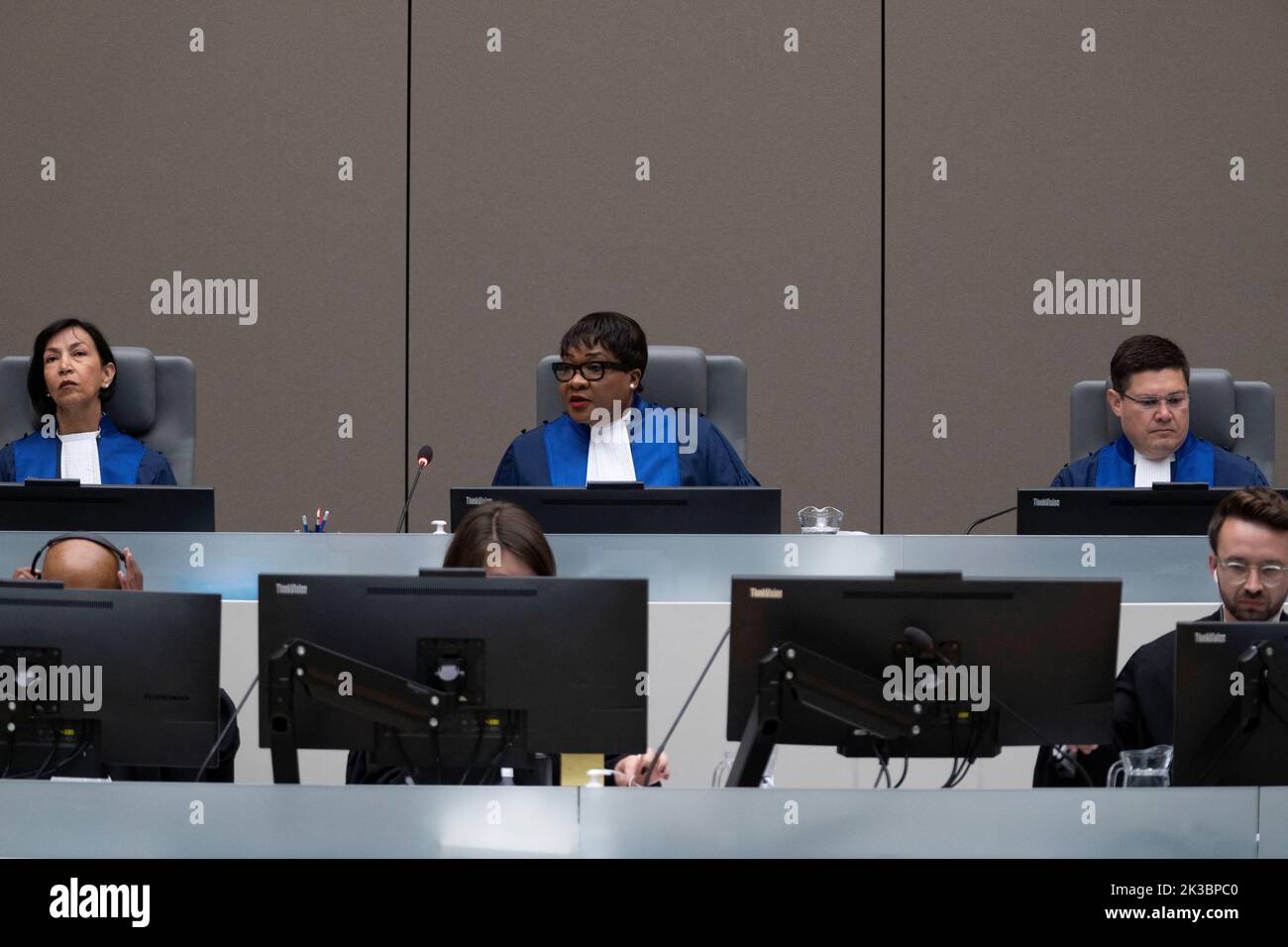 Presiding judge Miatta Maria Samba, center,  opens the trial of Mahamat Said Abdel Kani at the International Criminal Court in The Hague, Netherlands, Monday, Sept. 26, 2022. Peter Dejong/Pool via REUTERS Stock Photo