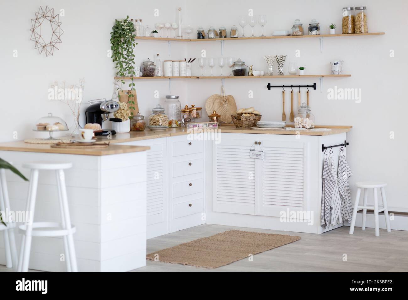 Cozy white empty kitchen, interior made in rural style Stock Photo - Alamy