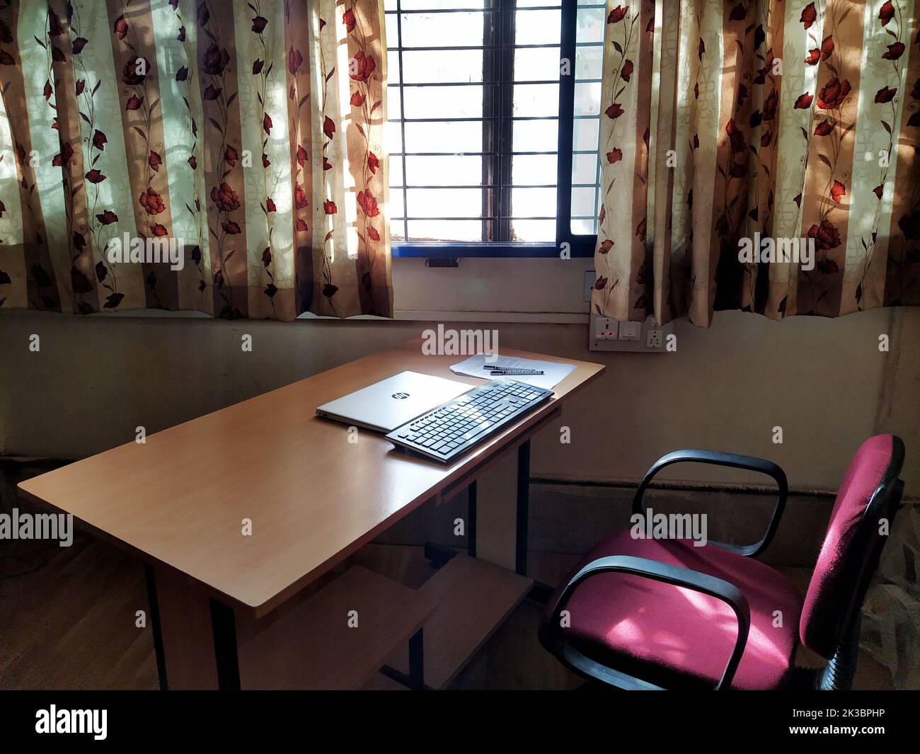 Workspace  by window during lockdown or covid times, Dharwad,  Karnataka, India Stock Photo