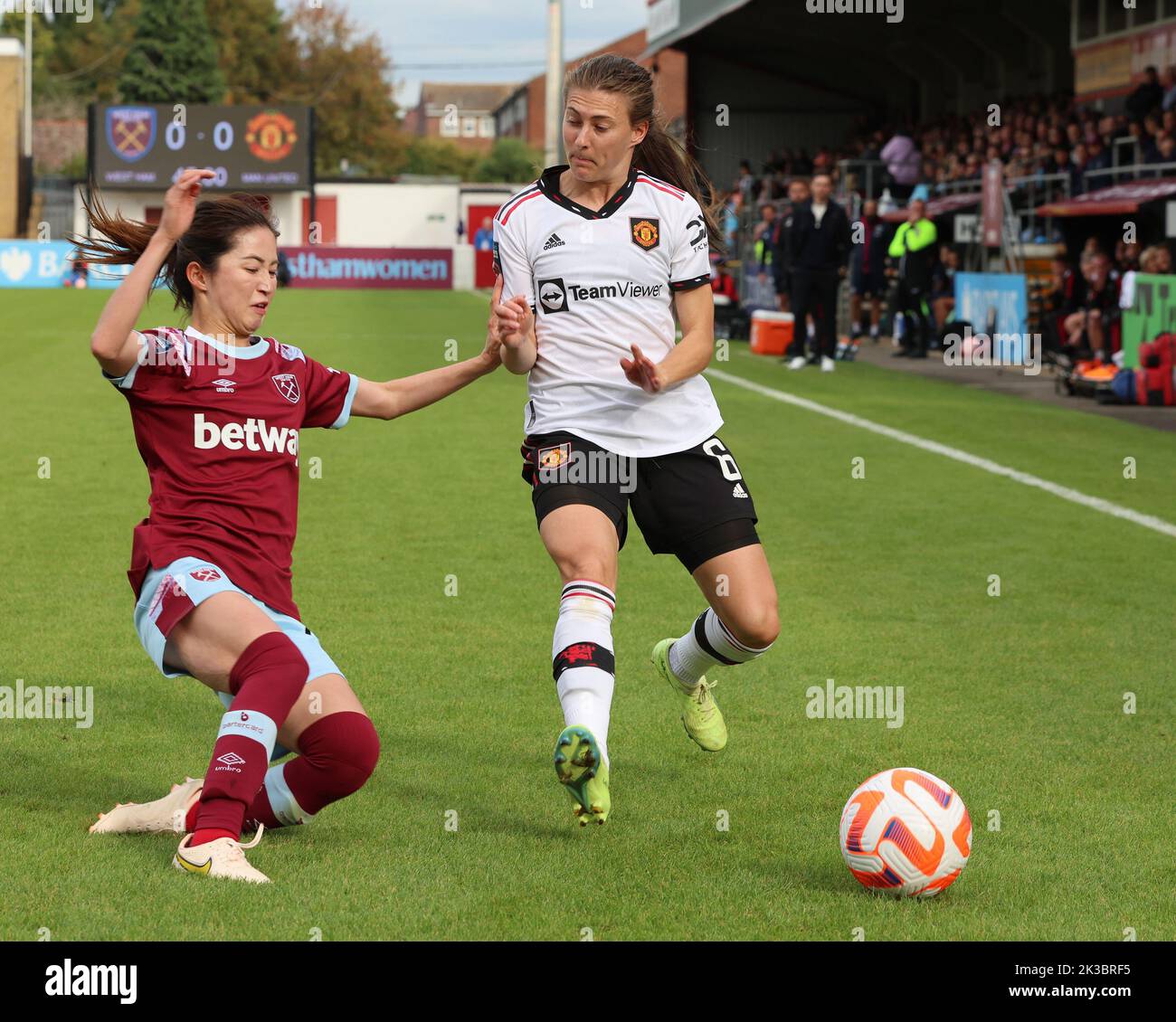 DAGENHAM ENGLAND - SEPTEMBER  25 : L-R Risa Shimizu! of West Ham United WFC and Ona Baille of Manchester United during Barclays Women's Super League m Stock Photo