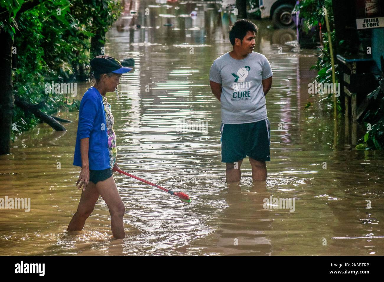 Marikina, Philippines. 26th Sep, 2022. Super typhoon victim walks on a flooded area to return on their properties after the raged of Noru. Super Typhoon Noru locally named as Karding battered in the landmass of Luzon island in the Philippines. Noru with the wind of 140 kilometers per hour near the center and gustiness of up to 170 km per hour forcing the evacuation of thousands of individuals specially in hardly hit and catch basin areas. (Photo by Ryan Eduard Benaid/SOPA Images/Sipa USA) Credit: Sipa USA/Alamy Live News Stock Photo