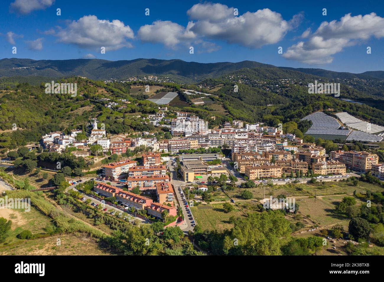 Aerial view of the town of Sant Cebrià de Vallalta. In the background, the Montnegre massif (Maresme, Barcelona, Catalonia, Spain) Stock Photo