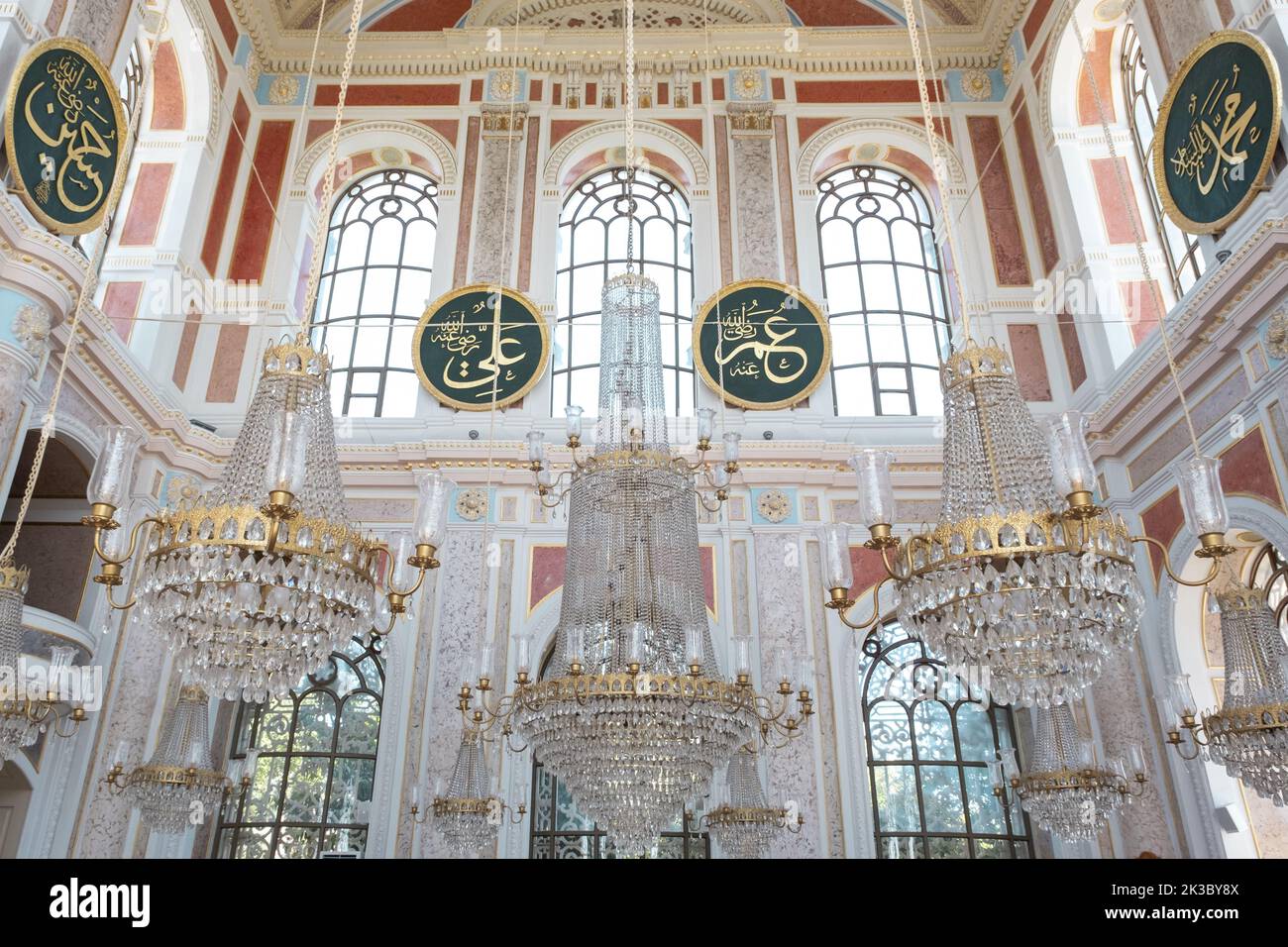 Interior of Ortakoy Mosque, Islamic green plate with Arabic text and