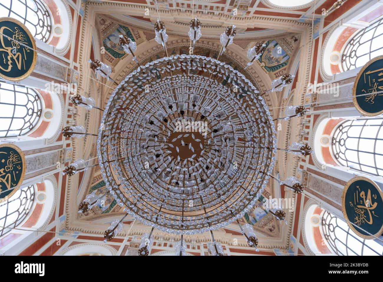 Beautiful dome with chandelier in Ortakoy Mosque, Interior of Ortakoy Mosque, Islamic ancient structure in Istanbul, dome with mosaic and decorations Stock Photo