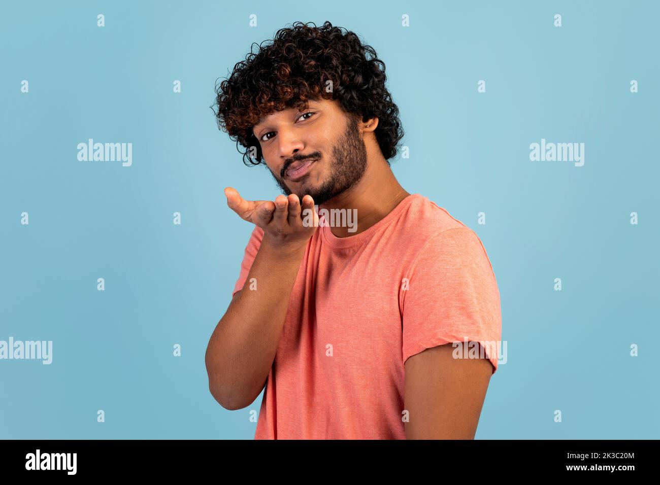 Handsome young man sending kiss hi-res stock photography and images - Alamy