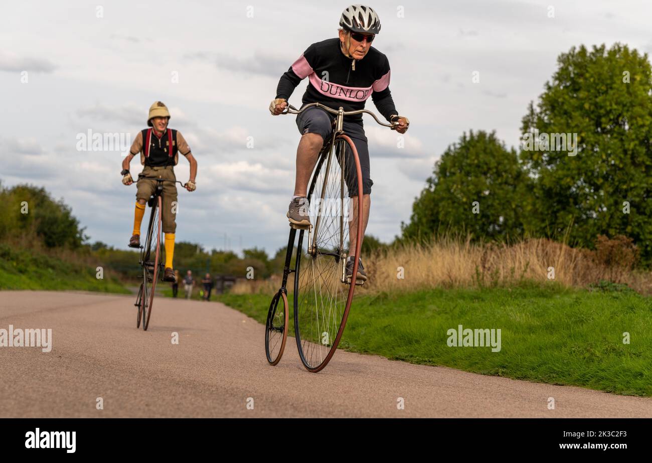 Cyclists taking part in the grand ordinary race hires stock