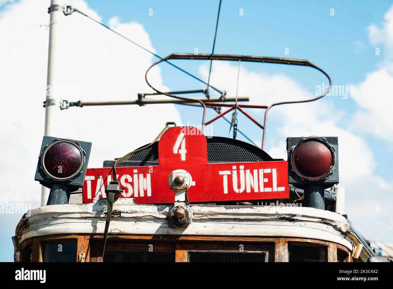 Taksim Tunnel signboard front of the famous red tram in Istanbul, close up to retro train, travel and sightseeing concept in Turkey Stock Photo