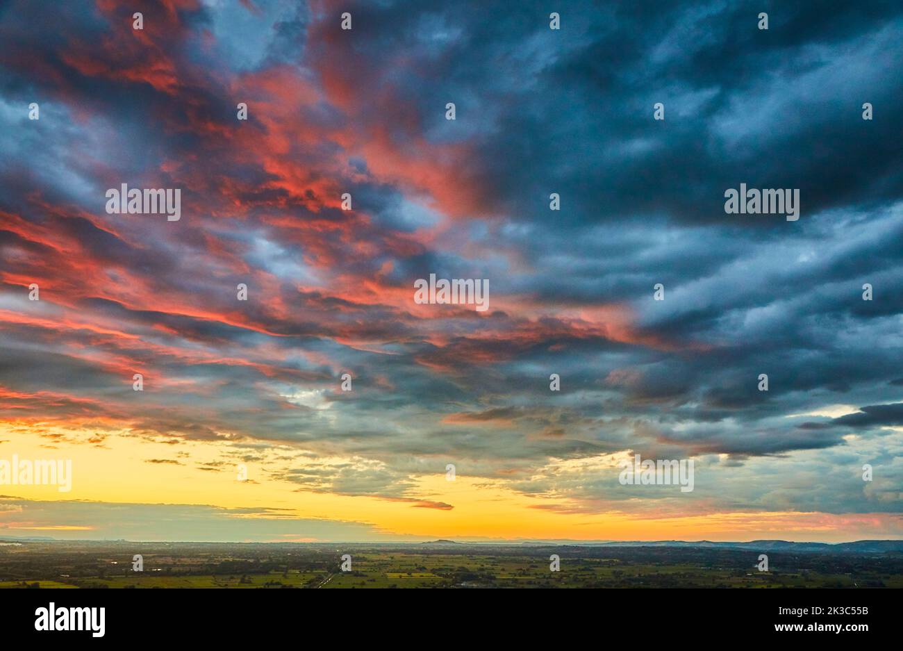 Dramatic clouds and sunset from Glastonbury Tor, Somerset Stock Photo