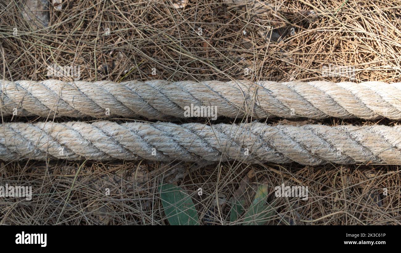 Thick rope rope, twisted or braided product made of natural fibers Stock Photo