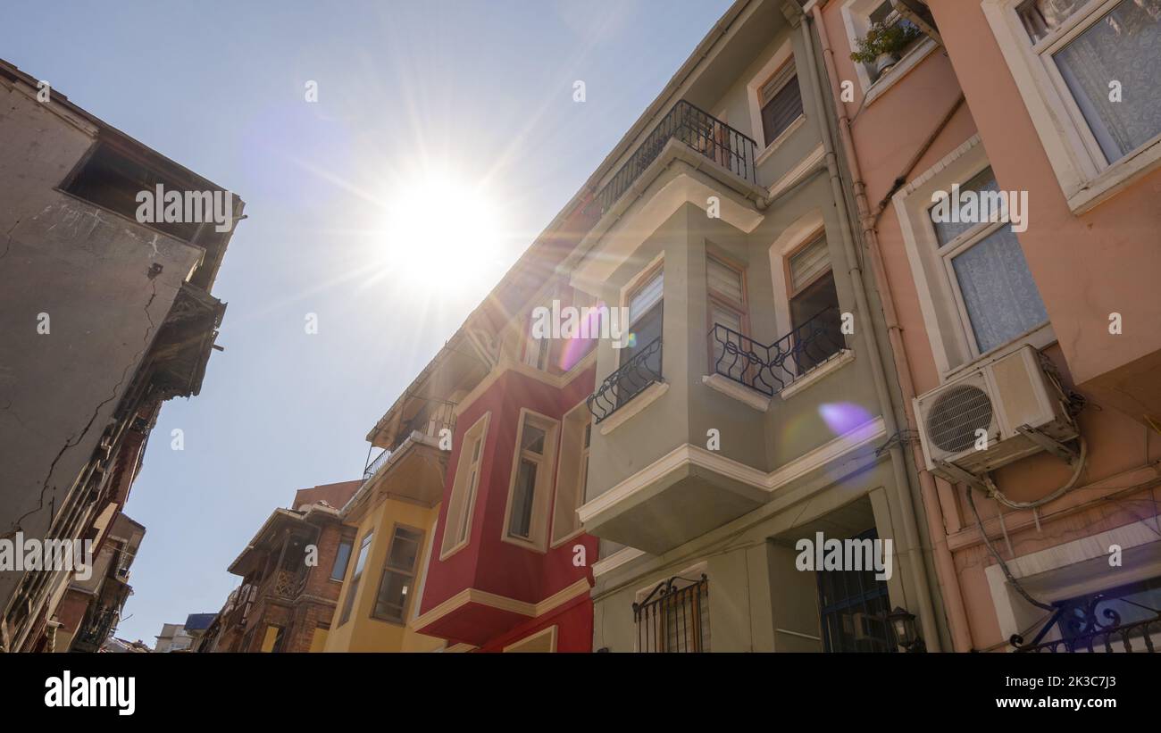 Colorful buildings in Balat with sunlight in background, travel and explore in Istanbul, beautiful colored buildings, popular sightseeing location Stock Photo
