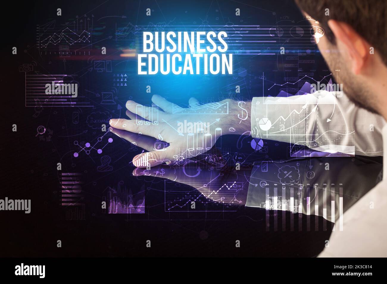 Businessman touching huge screen concept Stock Photo