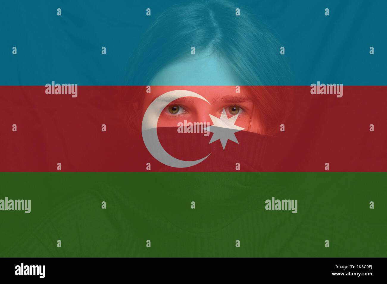 War between Armenia and Azerbaijan. Young woman with sad sight looking at camera. Art portrait. Azerbaijan flag. Face of depression. Caucasian woman w Stock Photo