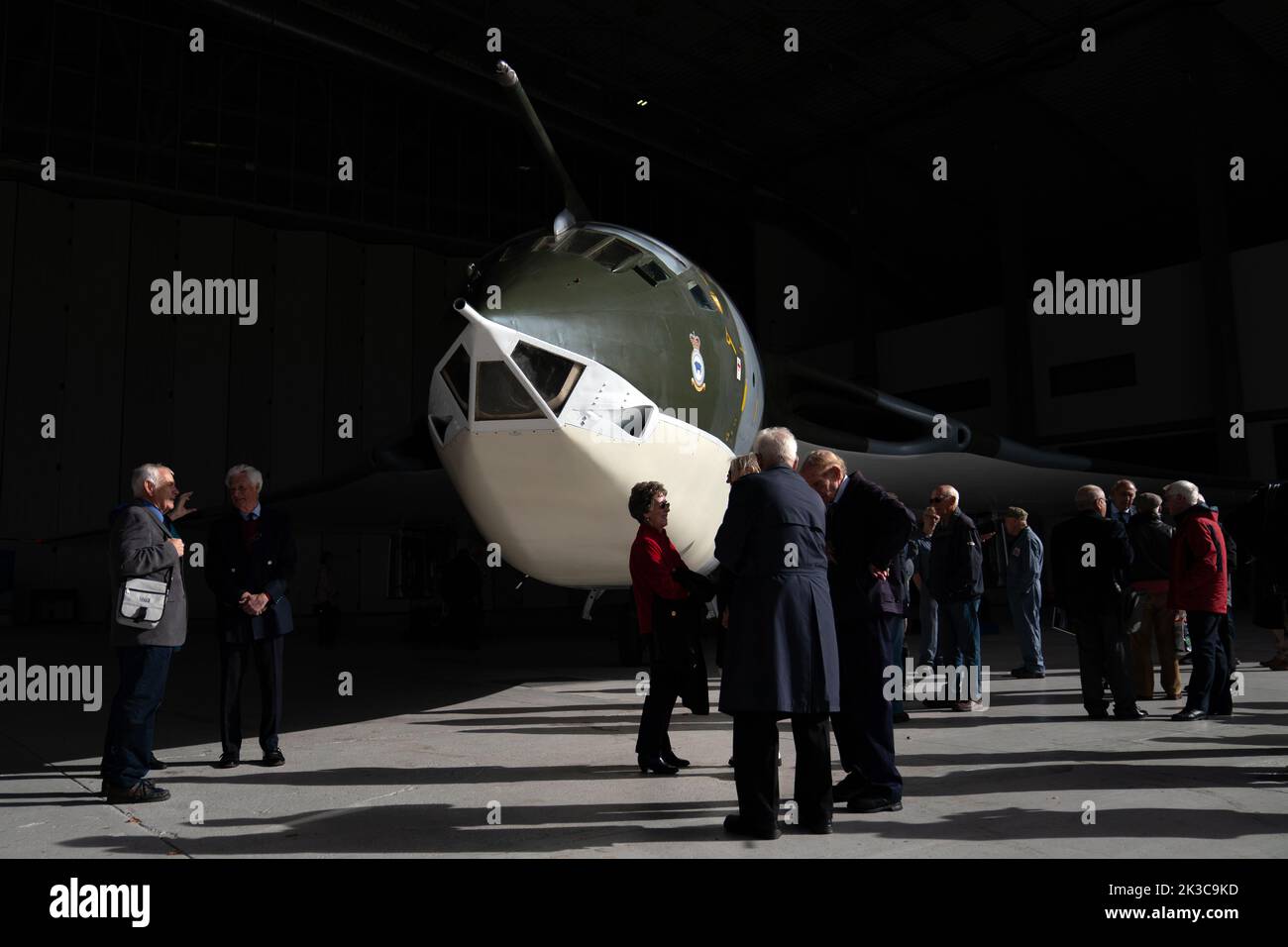 Cold War veterans, many of whom operated or worked on this very aircraft, admire the Handley Page Victor XH648 aircraft, which is on show at IWM Duxford, Cambridgeshire, following the completion of a five year restoration project. Picture date: Monday September 26, 2022. Stock Photo