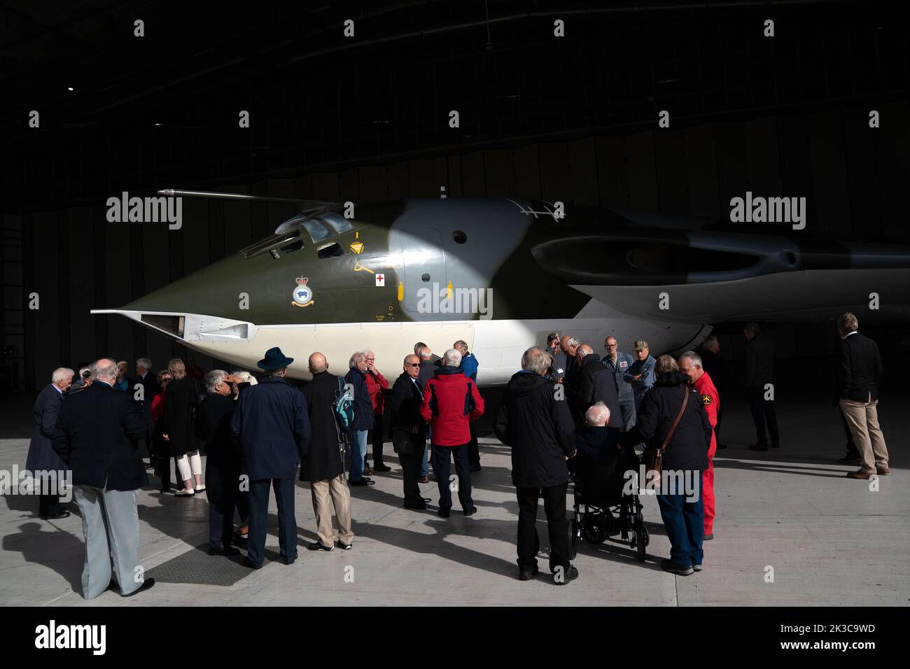 Cold War veterans, many of whom operated or worked on this very aircraft, admire the Handley Page Victor XH648 aircraft, which is on show at IWM Duxford, Cambridgeshire, following the completion of a five year restoration project. Picture date: Monday September 26, 2022. Stock Photo