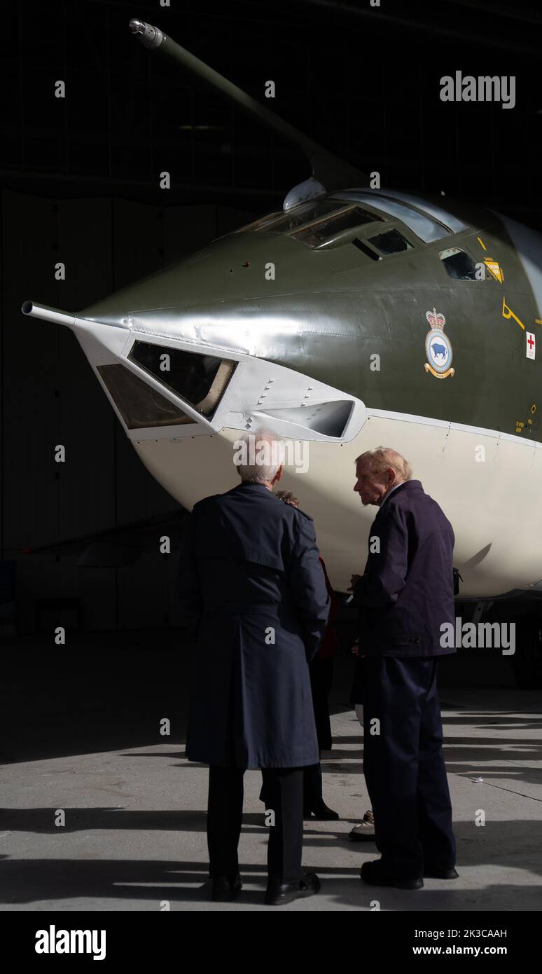 Cold War veterans, who operated and worked on this very aircraft, admire the Handley Page Victor XH648 aircraft, which is on show at IWM Duxford, Cambridgeshire, following the completion of a five year restoration project. Picture date: Monday September 26, 2022. Stock Photo