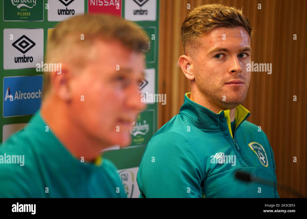 Republic of Ireland's Nathan Collins (right) and head coach Stephen Kenny during a press conference at the Aviva Stadium, Dublin. Picture date: Monday September 26, 2022. Stock Photo