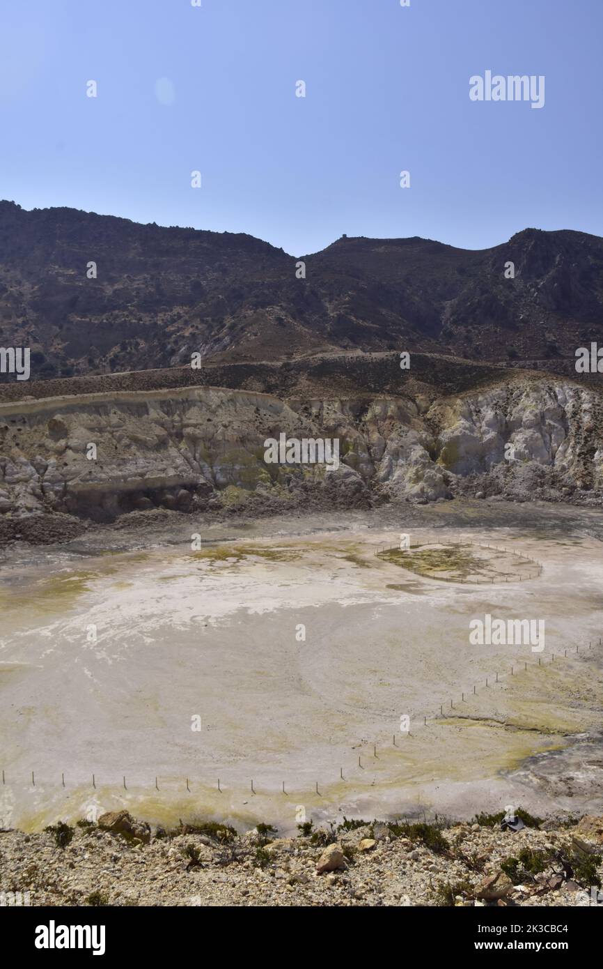 A view of the active hydrothermal crater of Stefanos volcano on the Greek island of Nisyros on a summer holiday day. Stock Photo