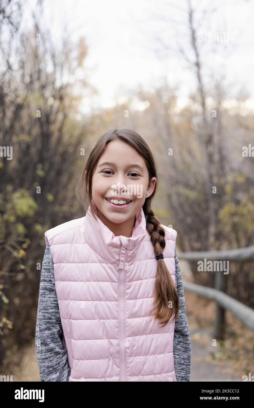 Portrait happy beautiful girl in pink vest Stock Photo