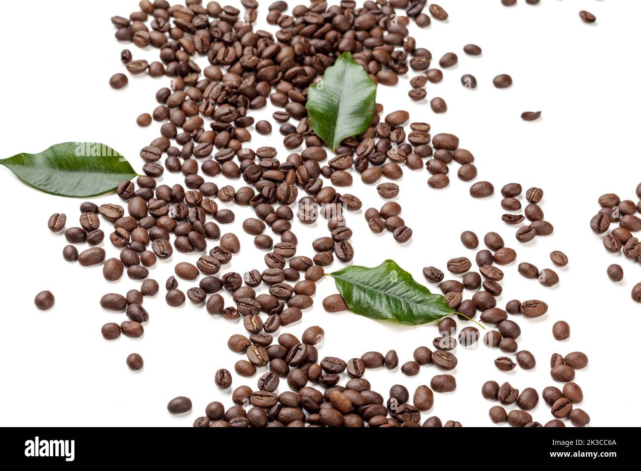 Pile coffee beans isolated on white background Stock Photo - Alamy