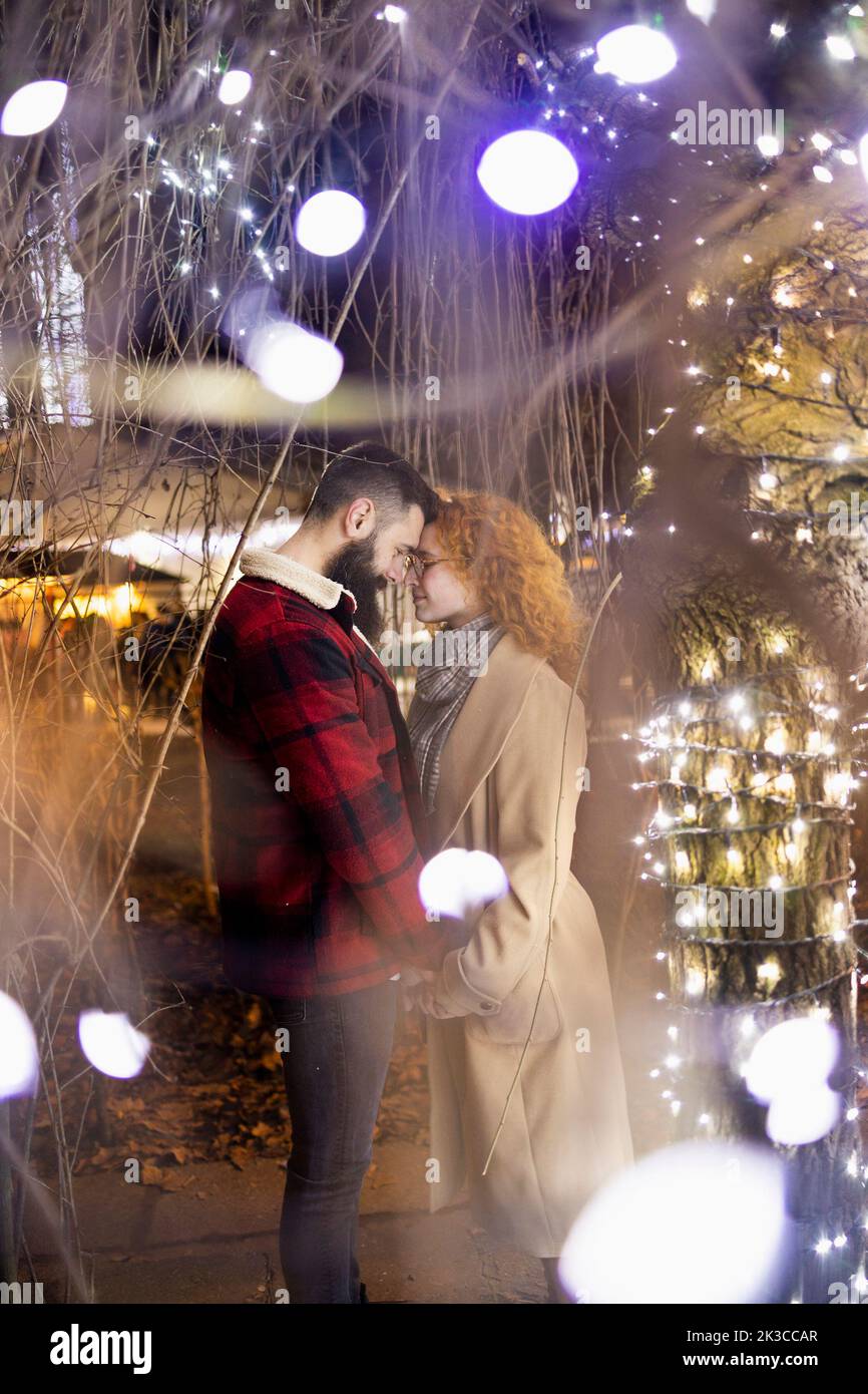A couple bonding together on a beautiful Christmas eve Stock Photo