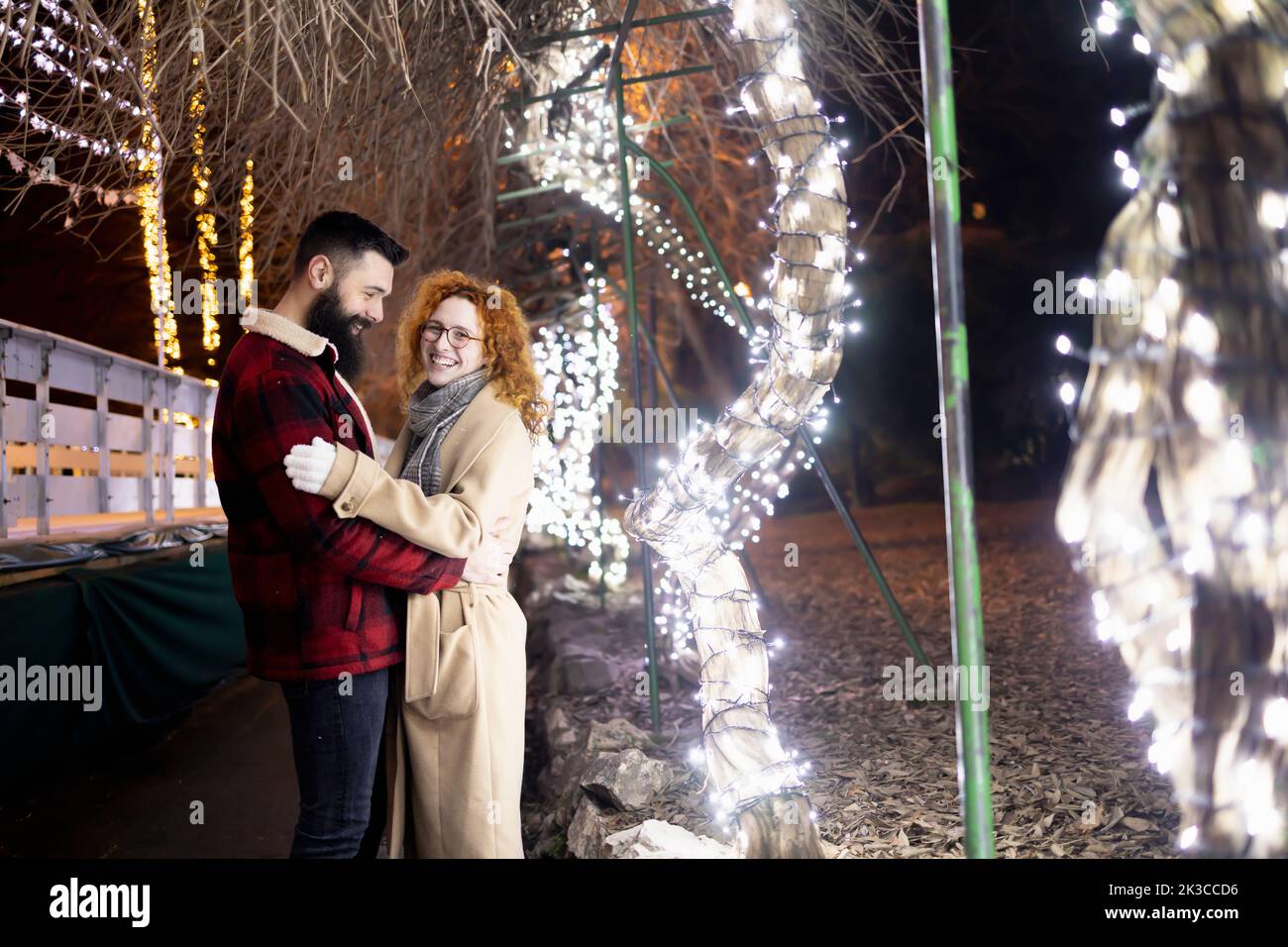 Young couple on a date on a beautiful winter night Stock Photo