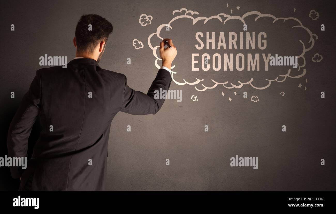 businessman drawing a cloud with inscription Stock Photo - Alamy