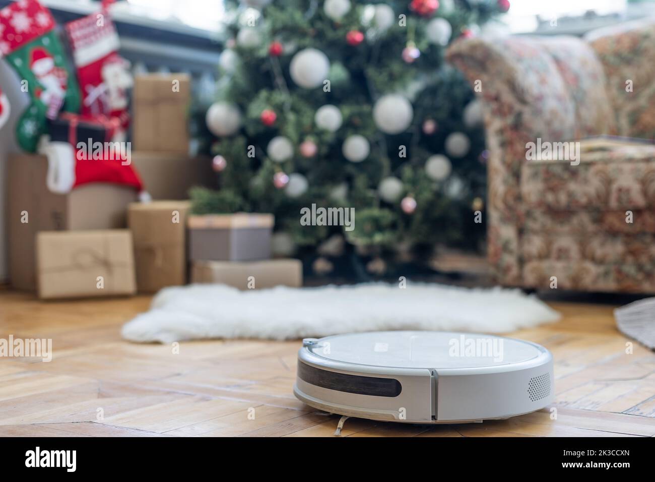 Smart home. Robot vacuum cleaner performs automatic cleaning of the