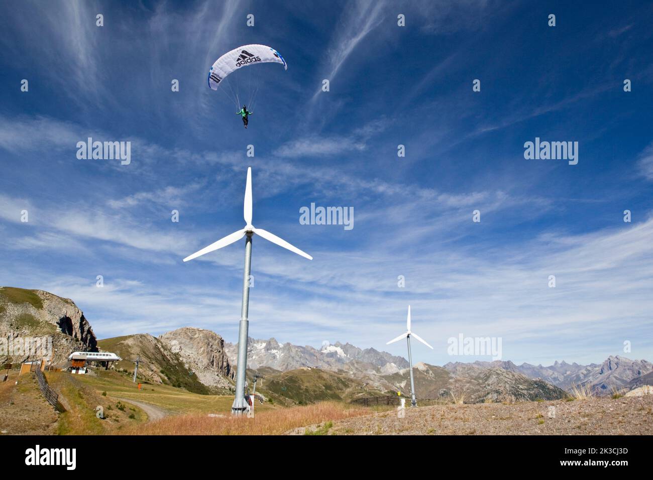 Paraglider and wind turbines hi-res stock photography and images - Alamy