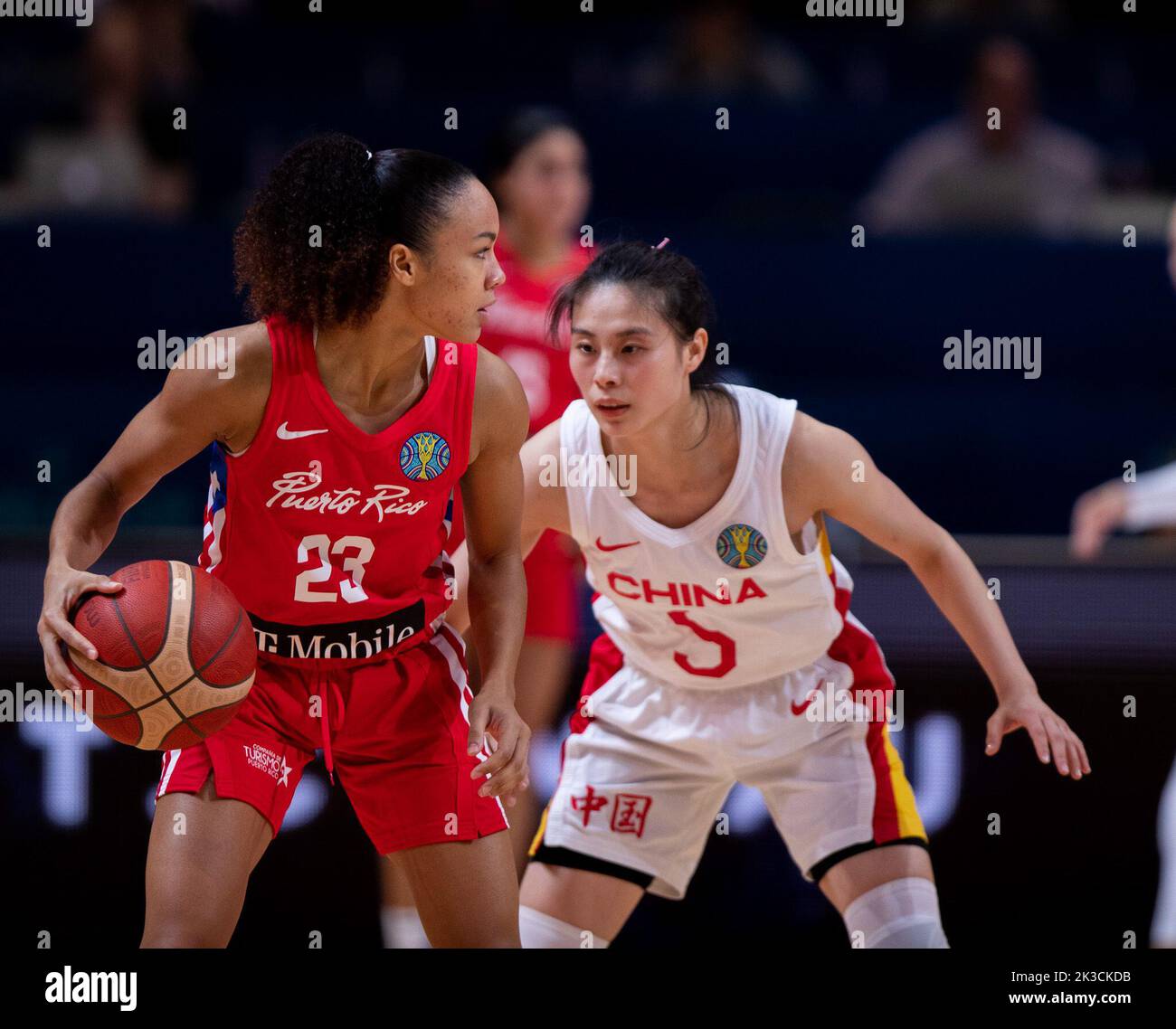 Sydney, Australia. 26th Sep, 2022. Trinity San Antonio (L) of Puerto Rico drives the ball as Wang Siyu of China defends during a Group A match between China and Puerto Rico at the FIBA Women's Basketball World Cup 2022 in Sydney, Australia, Sept. 26, 2022. Credit: Hu Jingchen/Xinhua/Alamy Live News Stock Photo