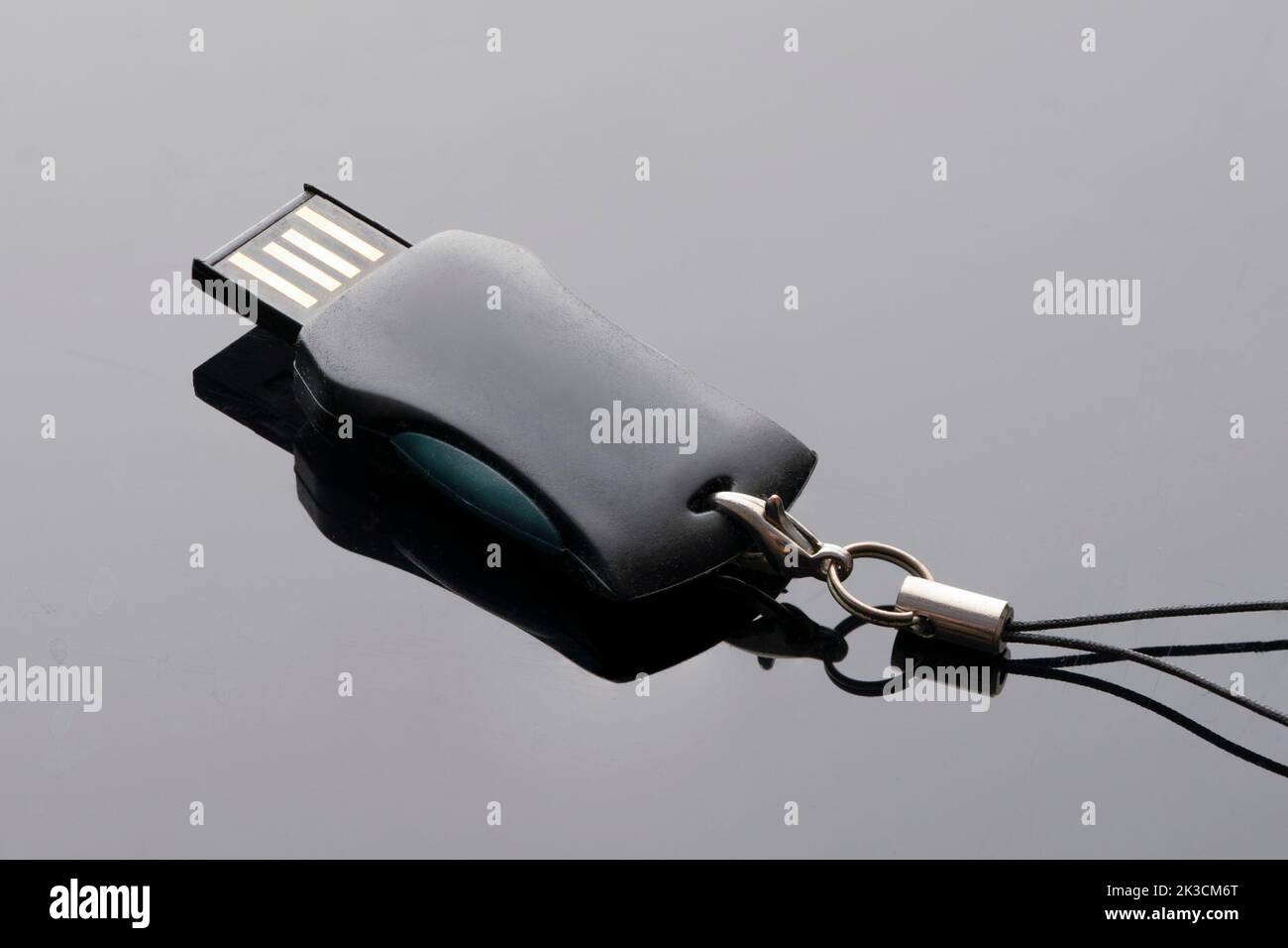 usb flash drive for computer folding on a black background close-up. Stock Photo