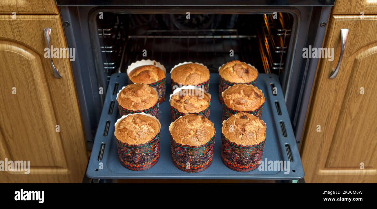 Baked Easter cakes in the oven. Spring Easter Feast Stock Photo