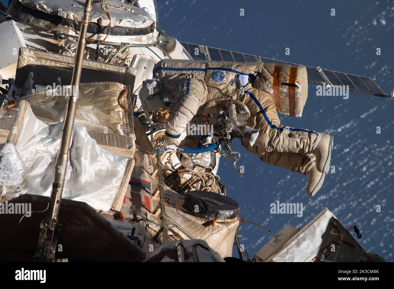 ISS - 21 July 2022 - Astronaut Samantha Cristoforetti of ESA (European Space Agency) works outside the Nauka multipurpose laboratory module on the Int Stock Photo