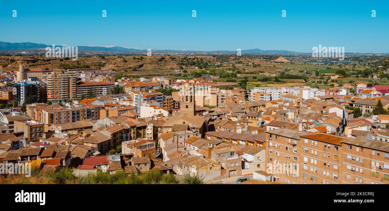 a panoramic view of Monzon, in the Huesca province of Aragon, Spain, highlighting the tower of the Cathedral of Santa Maria del Romeral, in the old to Stock Photo