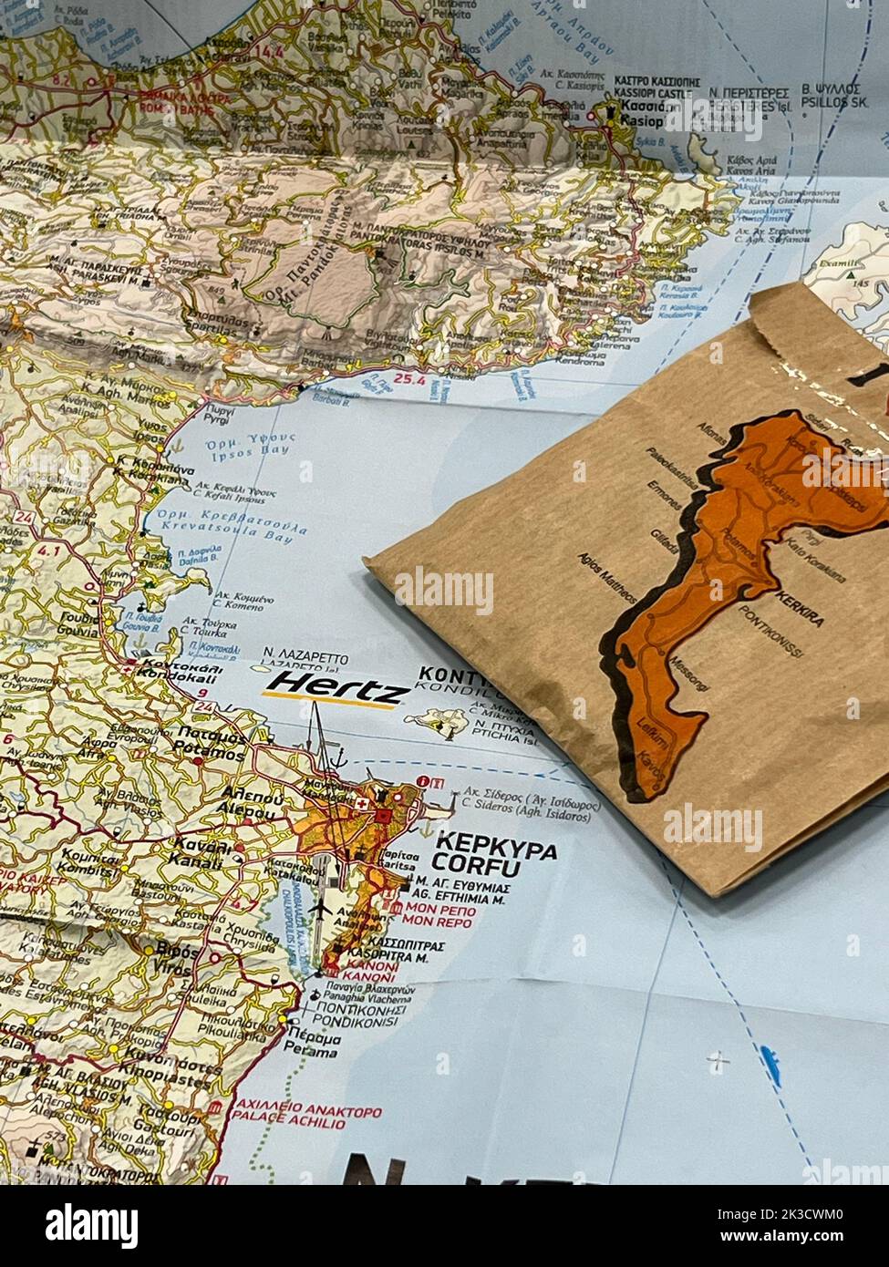 A vertical shot of a map focusing on coastal cities as traveling ...