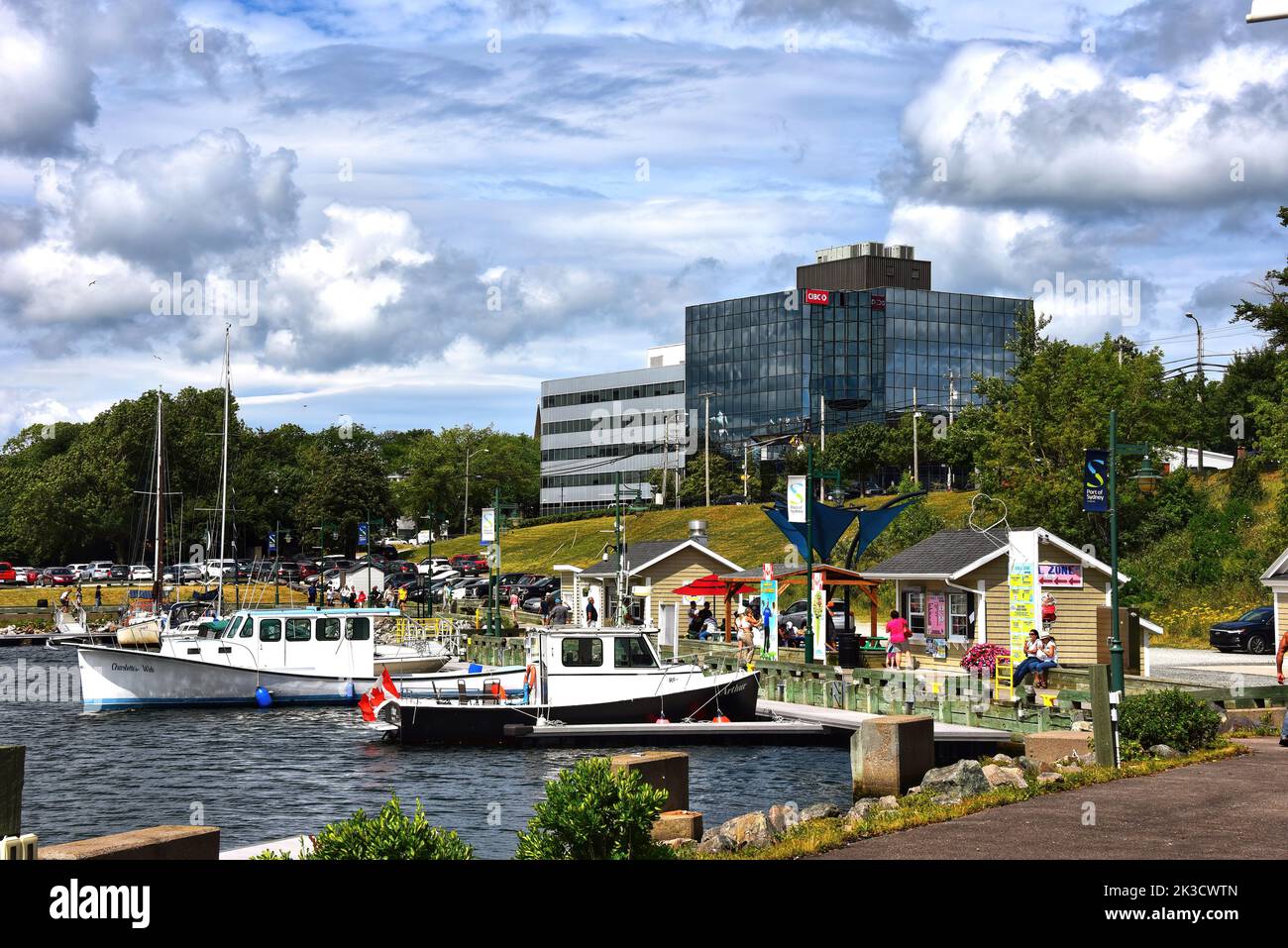 Sydney, Canada - August 2, 2022: View of the Port of Sydney and boardwalk, in Sydney Harbour, in Cape Breton Nova Scotia. Stock Photo