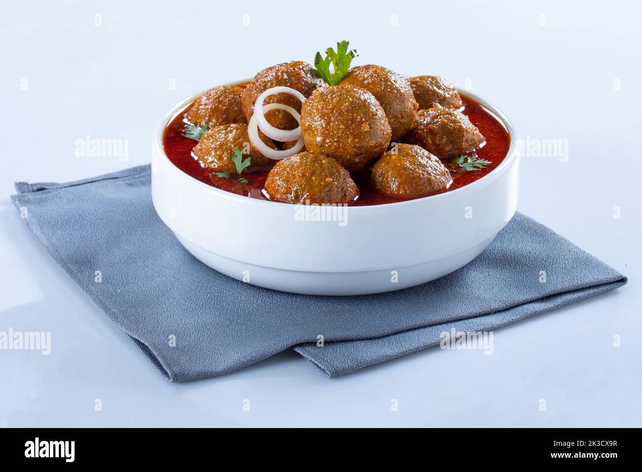 Chicken Meatballs with glaze on White background. Stock Photo