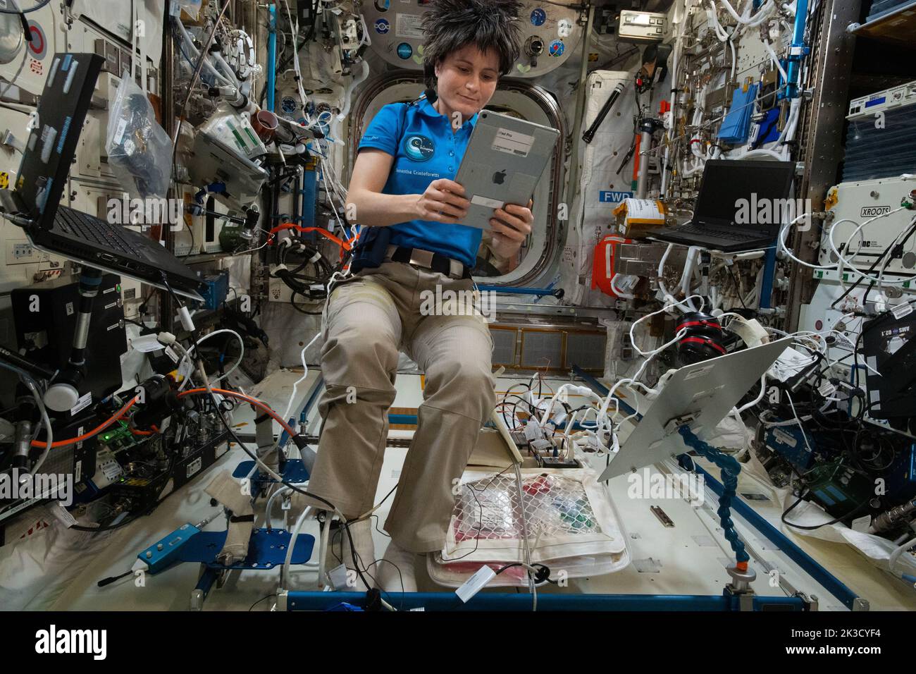 ISS - 08 July 2022 - Expedition 67 Flight Engineer and ESA (European Space Agency) astronaut Samantha Cristoforetti wears a microphone on her right sh Stock Photo