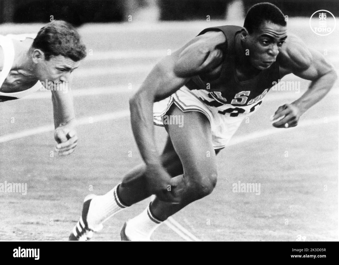 ROBERT HAYES American Winner of the Men's 100 Metre Dash in TOKYO OLYMPIAD the official documentary film of the 1964 Olympic Games (released 1965) director KON ICHIKAWA music Toshiro Mayuzumi Organizing Committee for the Games of the XVIII Olympiad / Toho Company Stock Photo