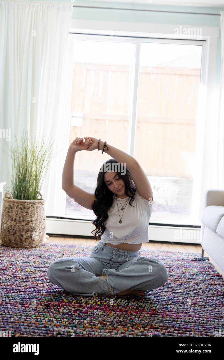 Woman stretching arms hi-res stock photography and images - Alamy