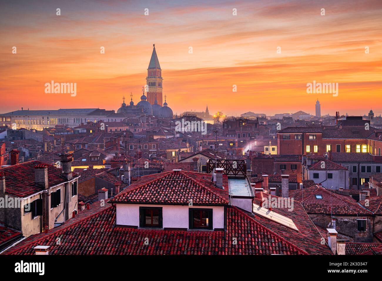 Venice, Italy rooftop skyline and historic landmarks at dusk. Stock Photo