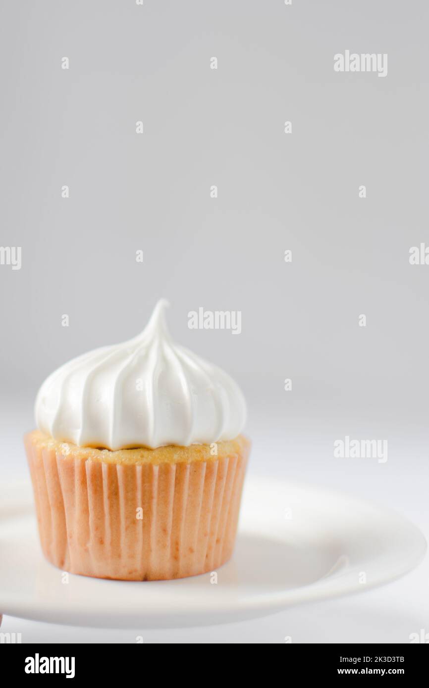 Vanilla Cupcake with a white frosting, Birthday cupcake with white buttercream Stock Photo