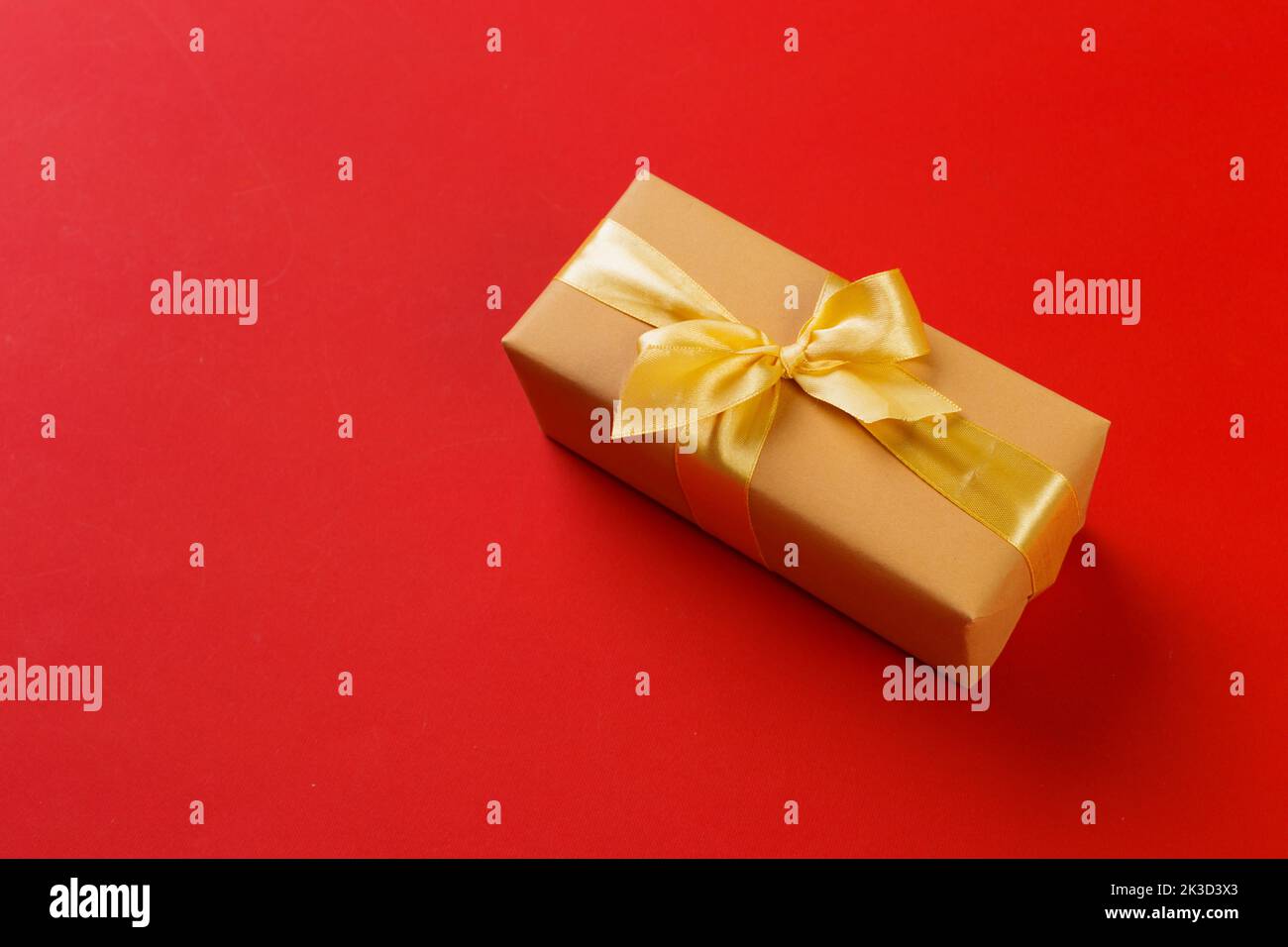 gift box on color background Stock Photo - Alamy