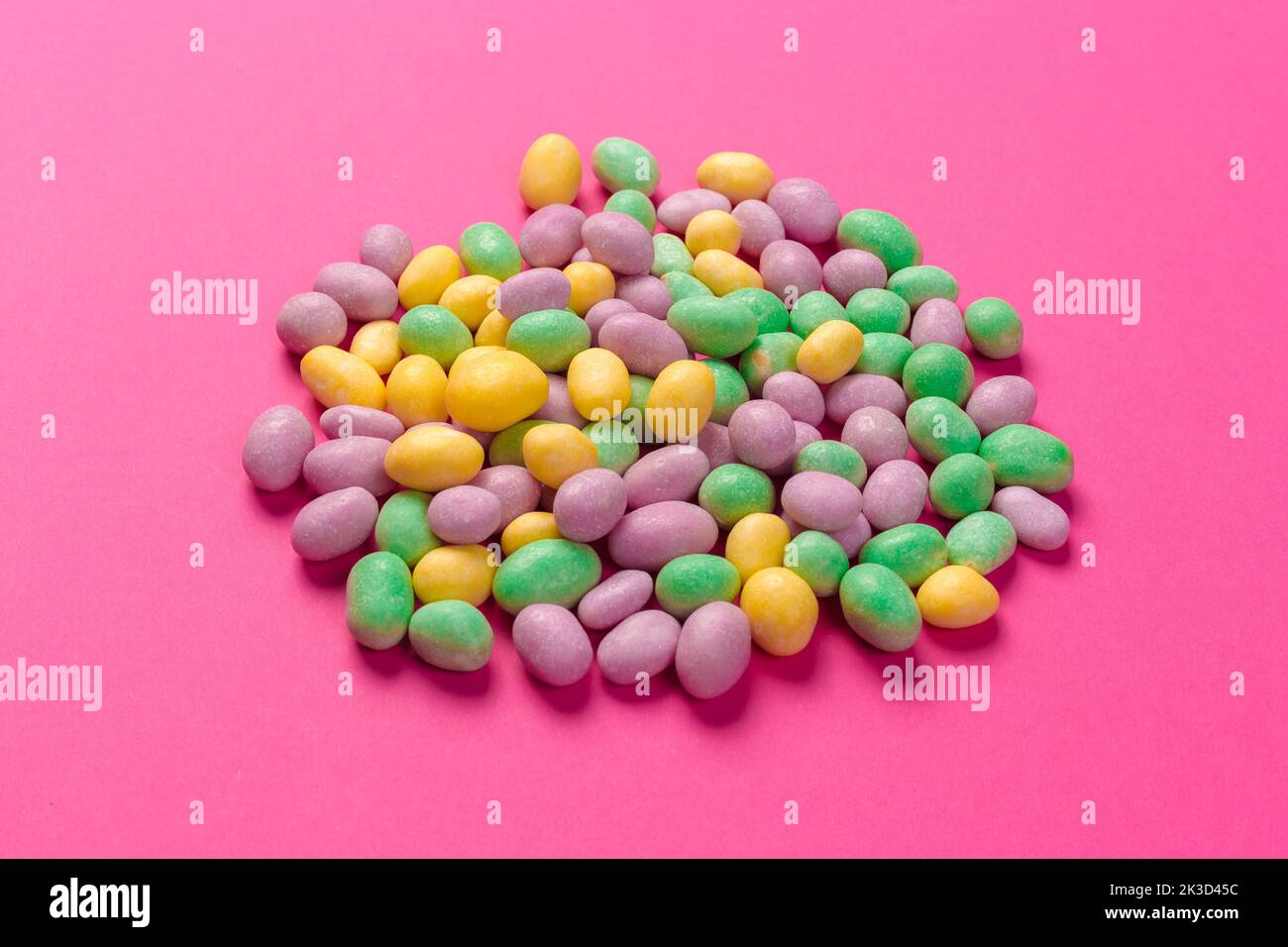 Colorful lollipops on a pink background Stock Photo