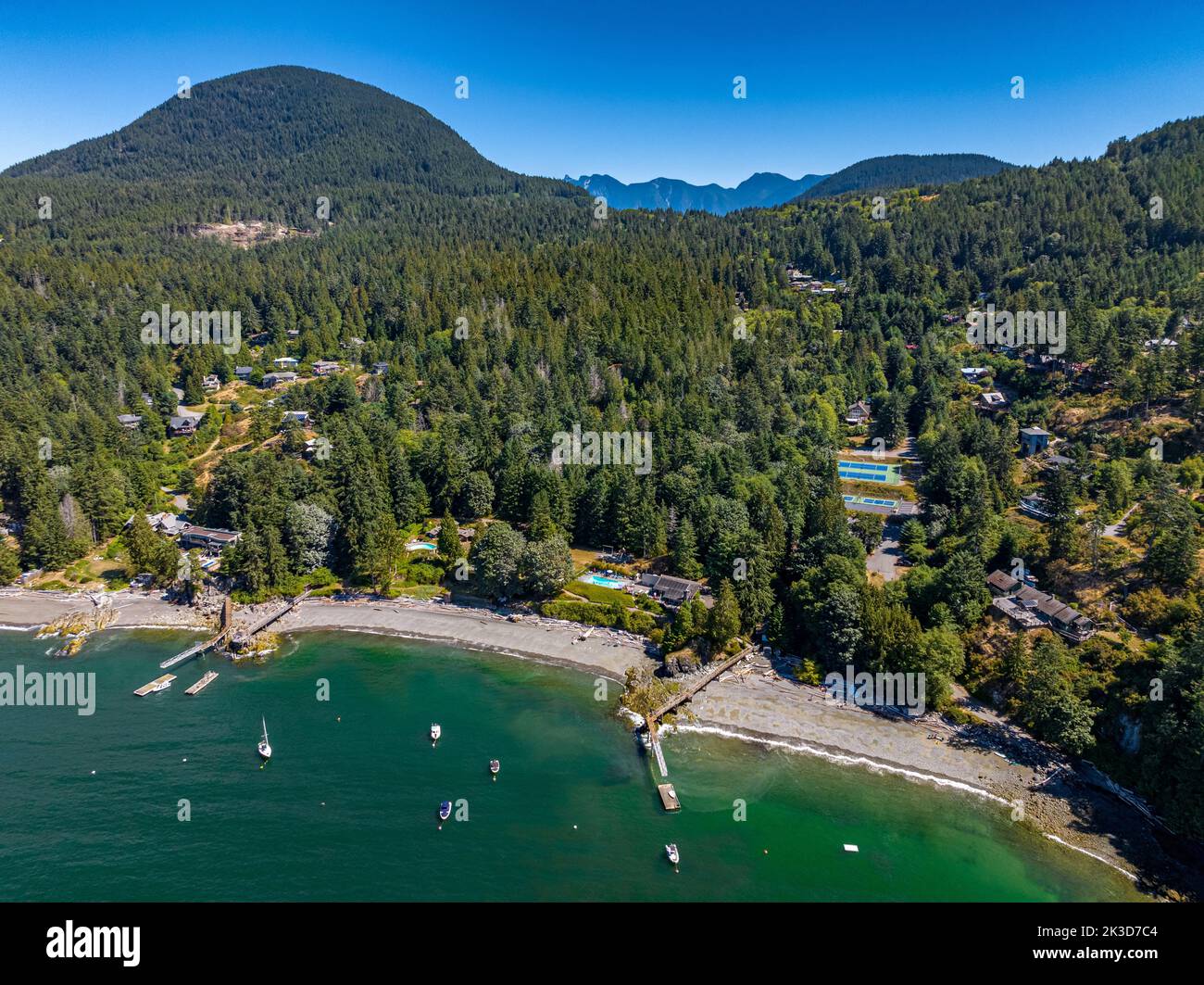 Snug Cove, Bowen Island, British Columbia, Canada. Aerial view of marina, ferry pier, sandy