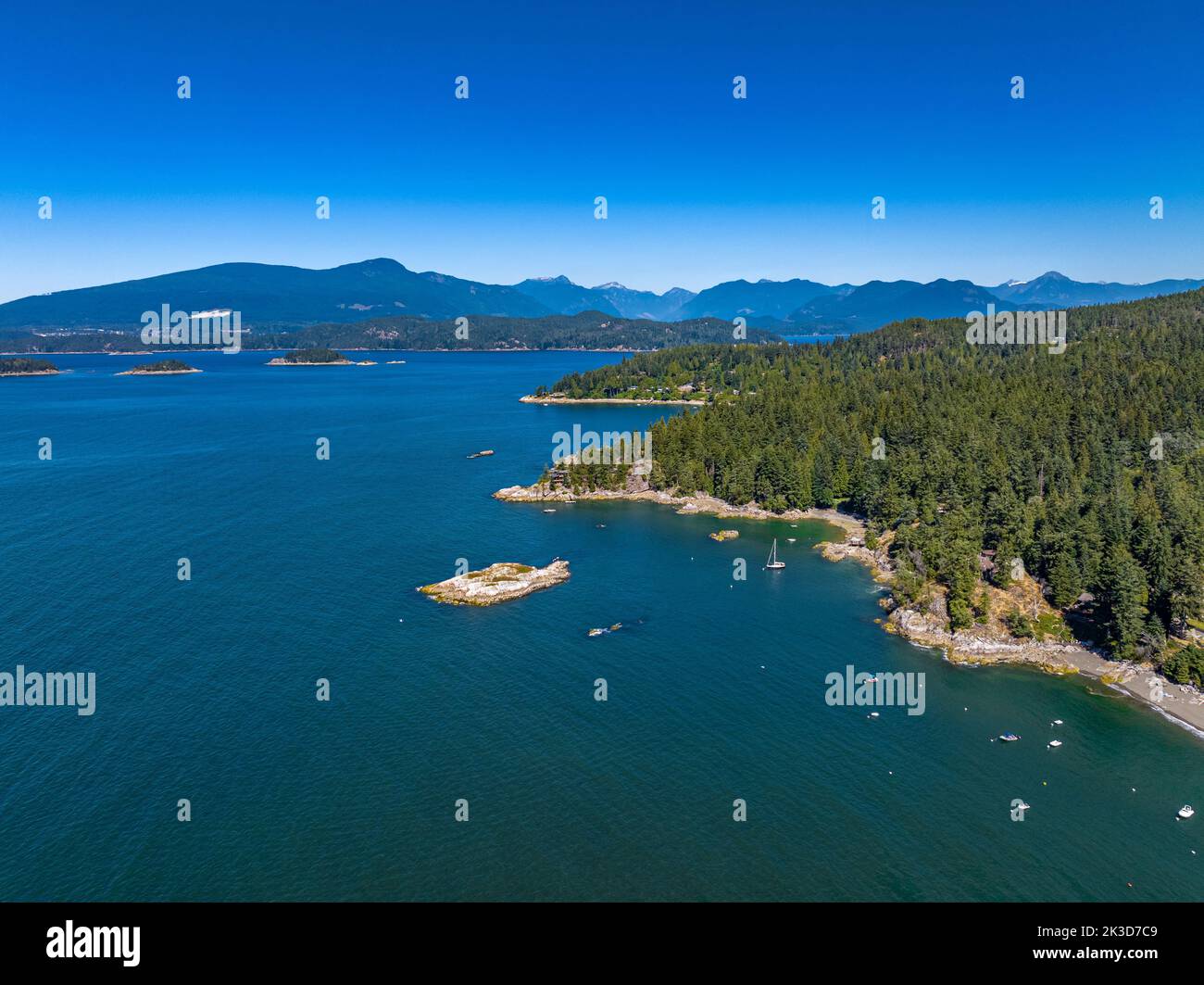 Snug Cove, Bowen Island, British Columbia, Canada. Aerial view of marina, ferry pier, sandy