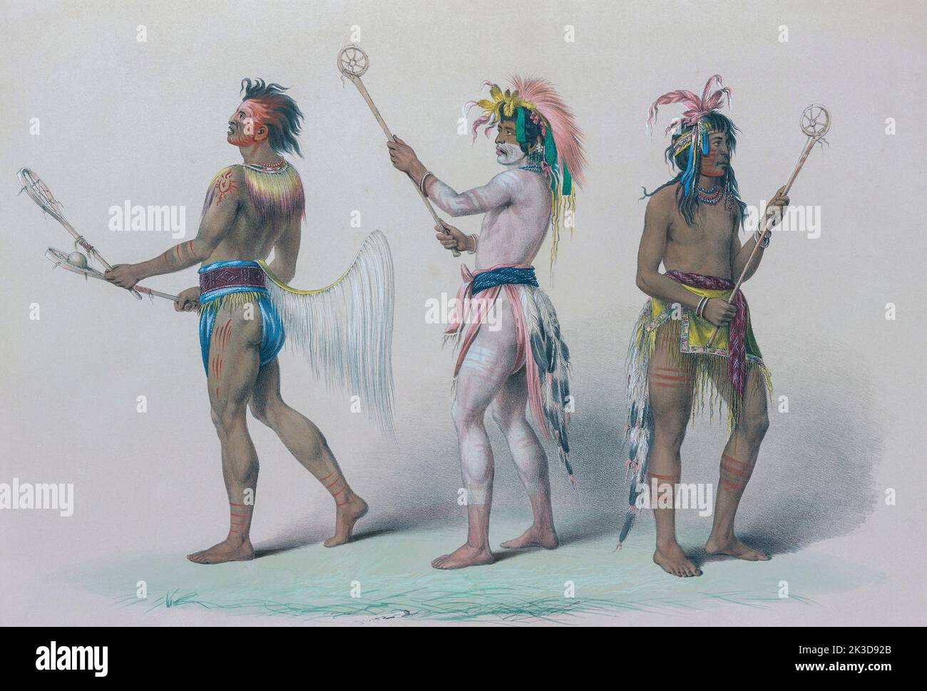 Three ball players.  From the left: A Choctaw;  A Sioux from the Upper Mississippi;  A Sioux from the Missouri.  From Catlin's North American Indian Portfolio, published in London 1844 by the artist, American adventurer George Catlin, 1796 - 1872.  During many journeys Catlin recorded with pen and brush the customs and life-styles of Native American tribes. Stock Photo